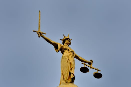 Statue on top of old bailey