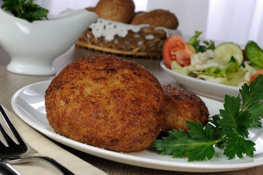 Chicken cutlets in bread crumbs on the dining table