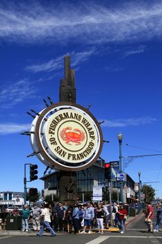 San Francisco, California - August 17, 2013: Unidentified people visit Fishermans Wharf on August 17, 2013 in San Francisco, California, US. Here is famous tourist attractions, approximately 12 million visitors a year.