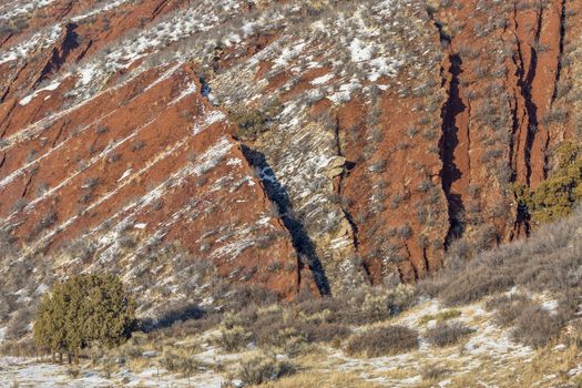 layers of red sandstone rock - winter scenery in Red Mountain Open Space near Fort Collins, Colorado