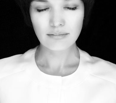 Close up of woman with closed eyes and white prints of flour on face on black background






Close up of woman with closed eyes and white prints of flour on face on black background