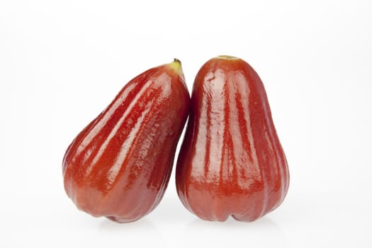 Two rose apple on a white background.