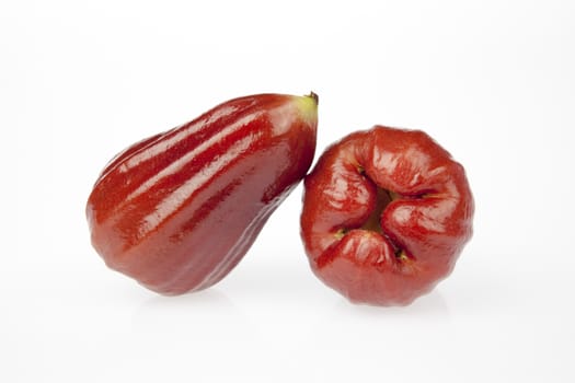 Two rose apple on a white background.