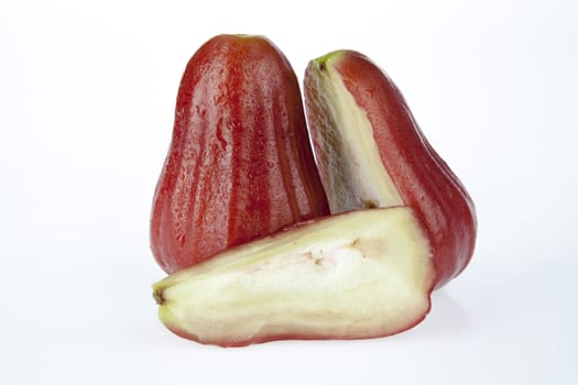 Two rose apple on a white background.