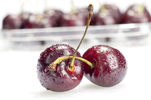 Two beautiful cherry and cherry on white background.