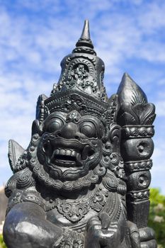 The old stone statue. Indonesia, Bali.
