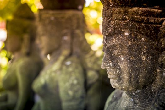 The old stone statue. Indonesia, Bali.
