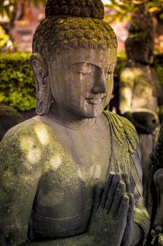 The old stone statue. Indonesia, Bali.
