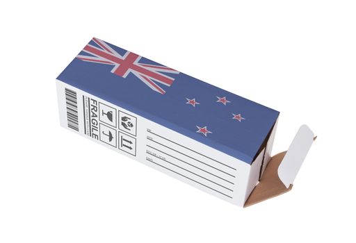 Concept of export, opened paper box - Product of New Zealand