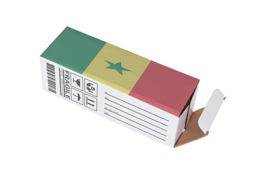 Concept of export, opened paper box - Product of Senegal