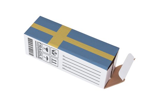 Concept of export, opened paper box - Product of Sweden
