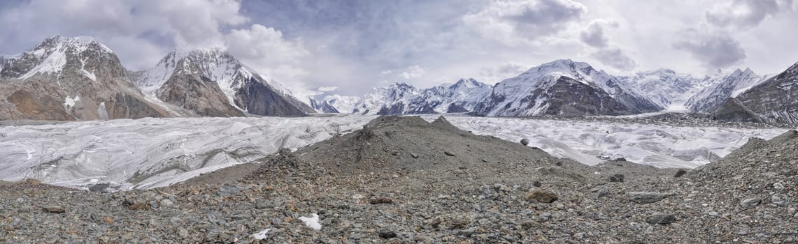 Scenic panorama of Engilchek glacier in picturesque Tian Shan mountain range in Kyrgyzstan