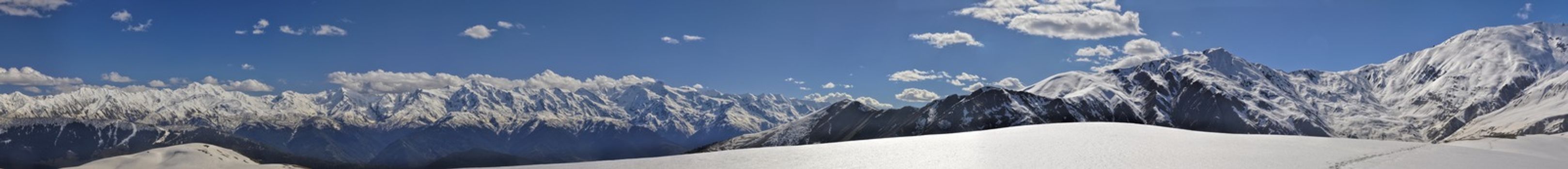 Scenic panorama of Caucasus mountains covered in snow, Svaneti, Georgia