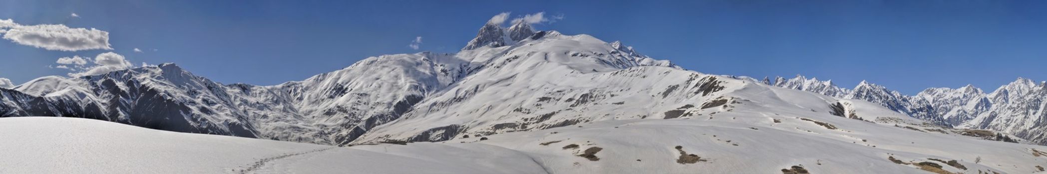 Scenic panorama of Caucasus mountains covered in snow, Svaneti, Georgia
