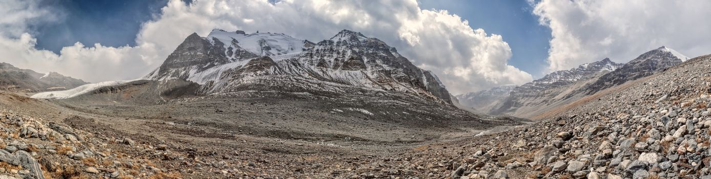 Scenic panorama of valley on arid landscape in Tajikistan on sunny day