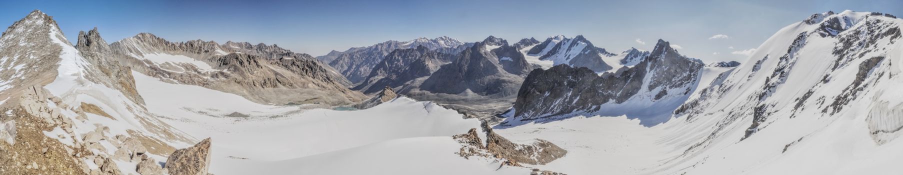 Scenic panorama of highest mountain peaks in Ala Archa national park in Tian Shan mountain range in Kyrgyzstan