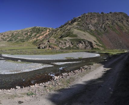 Road to Ala Archa national park in Tian Shan mountain range in Kyrgyzstan