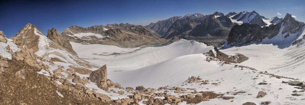 Scenic panorama of highest mountain peaks in Ala Archa national park in Tian Shan mountain range in Kyrgyzstan