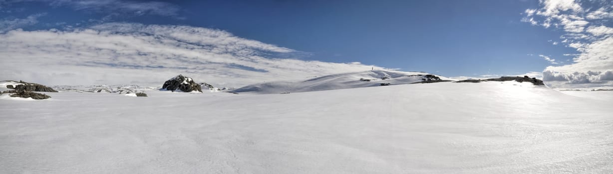 Scenic panorama of snowy landscape near Trolltunga in Norway