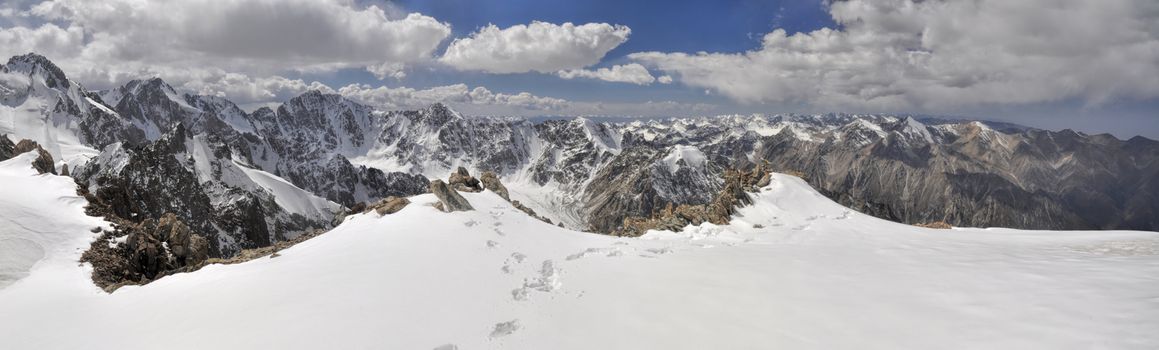 Scenic panorama of highest mountain peaks in Ala Archa national park in Tian Shan mountain range in Kyrgyzstan