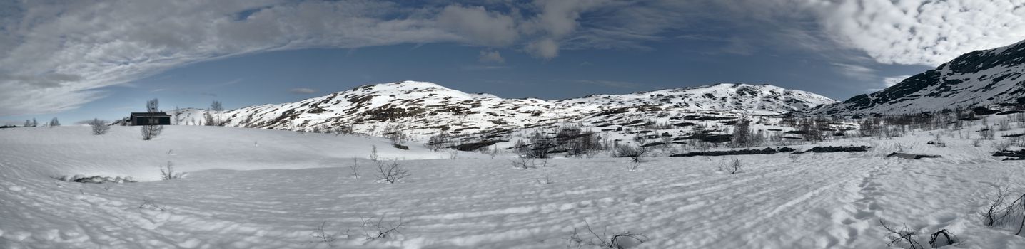 Scenic panorama of snowy landscape near Trolltunga in Norway