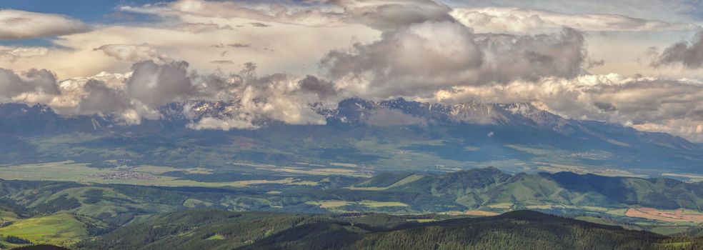 Panoramic view of High Tatras in Slovakia from summit of Kralova hola mountain