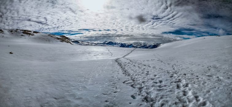 Scenic panorama of snowy landscape near Trolltunga in Norway