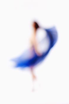 Abstract Out of Focus Image of a Woman with Blue Cloth