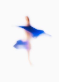 Abstract Out of Focus Image of a Woman with Blue Cloth