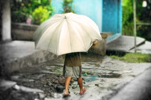littel boy with umbrella