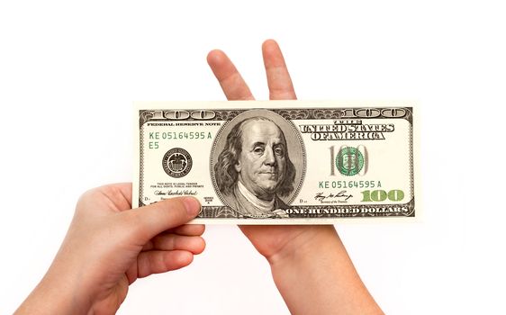 Children Hand holding 100 dollars (one hundred dollars banknote)