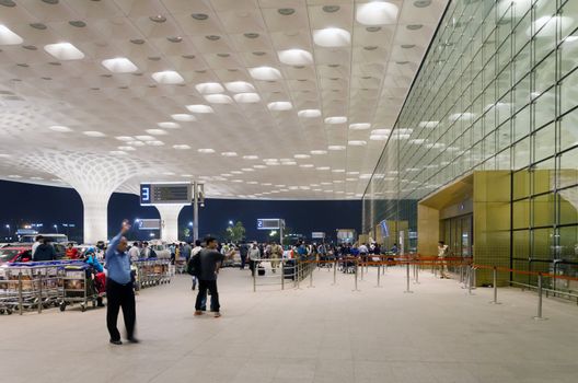 Mumbai, India - January 5, 2015: Tourist visit Chhatrapati Shivaji International Airport. The New Terminal 2, International Departures on January 5, 2015 in Mumbai, India.  Skidmore, Owings and Merrill (SOM) was the architectural designer of the project. 