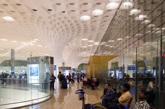 Mumbai, India - January 5, 2015: Tourist visit Chhatrapati Shivaji International Airport. The New Terminal 2, International Departures on January 5, 2015 in Mumbai, India.  Skidmore, Owings and Merrill (SOM) was the architectural designer of the project. 