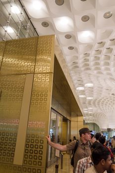 Mumbai, India - January 5, 2015: Tourist visit Chhatrapati Shivaji International Airport. The New Terminal 2, International Departures on January 5, 2015 in Mumbai, India. Skidmore, Owings and Merrill (SOM) was the architectural designer of the project.