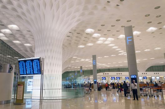 Mumbai, India - January 5, 2015: Crowd at Chhatrapati Shivaji International Airport. The New Terminal 2, International Departures on January 5, 2015 in Mumbai, India. Skidmore, Owings and Merrill (SOM) was the architectural designer of the project. 