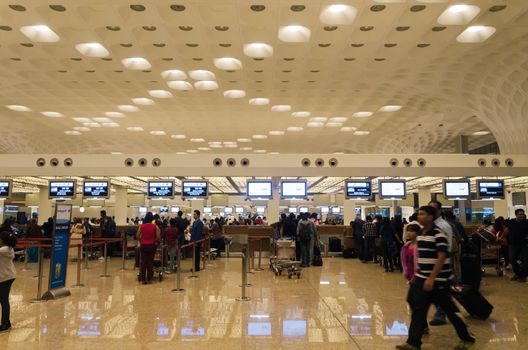 Mumbai, India - January 5, 2015: Crowd at Chhatrapati Shivaji International Airport. The New Terminal 2, International Departures on January 5, 2015 in Mumbai, India. Skidmore, Owings and Merrill (SOM) was the architectural designer of the project. 