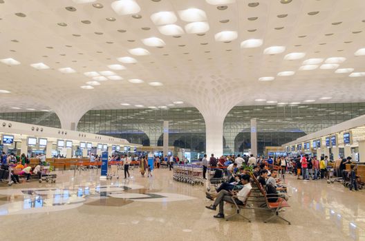 Mumbai, India - January 5, 2015: Crowd at Chhatrapati Shivaji International Airport. The New Terminal 2, International Departures on January 5, 2015 in Mumbai, India. Skidmore, Owings and Merrill (SOM) was the architectural designer of the project. 