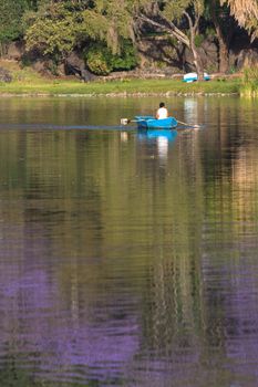 The beautiful Babogaya Lake warmly lit by the rising sun on a clear morning in Debre Zeit, Ethiopia.