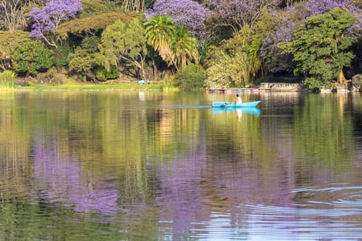 The beautiful Babogaya Lake warmly lit by the rising sun on a clear morning in Debre Zeit, Ethiopia.