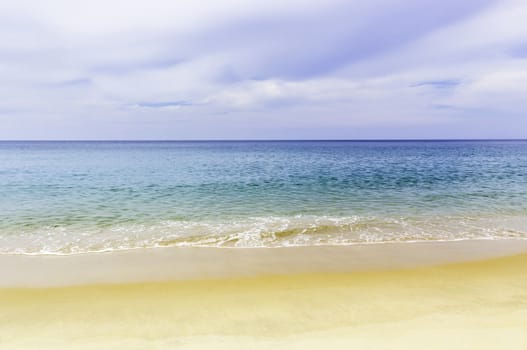 Closeup beautiful of tropical sea and sandy beach