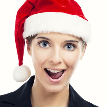 Portrait of a beautiful blonde woman wearing a Santa hat