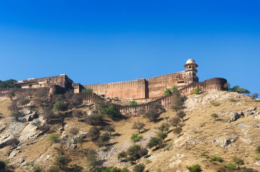 Ancient walls of Amber Fort with landscape in Jaipur, Rajasthan, India 