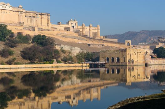 Amber fort reflection on the lake, Jaipur, Rajasthan, India 