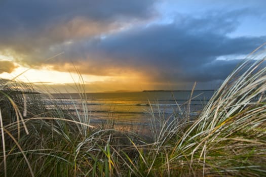 a beautiful view from the sand dunes of Beal beach and sunset in county Kerry Ireland