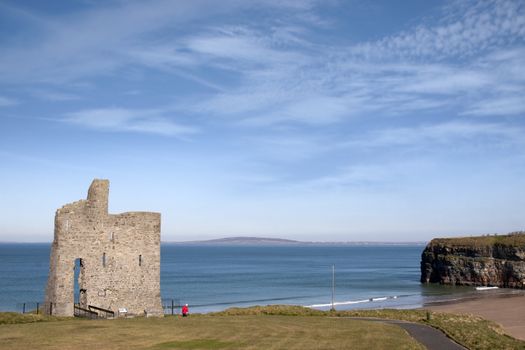 a beautiful path with tourist walking to Ballybunion beach and castle