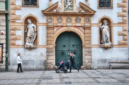 GRAZ, AUSTRIA - JAN 14: Tourists along city streets on January 14, 2010 in Graz, Austria. Almost 1 million people visit the city every year.