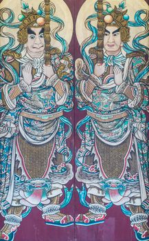 Painting of soldiers at the doors of Chinese temple