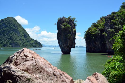 Khao Phing Kan is an island in Thailand, in Phang Nga Bay northeast of Phuket. Since 1974, when it was featured in the James Bond movie The Man with the Golden Gun, Khao Phing Kan has been popularly called James Bond Island.