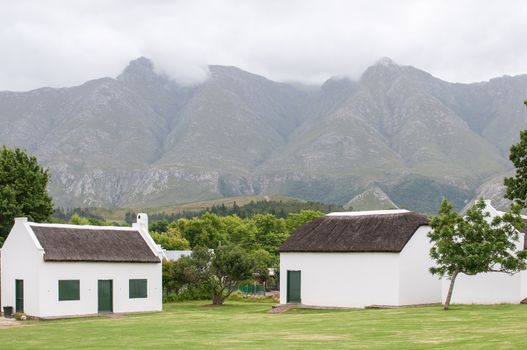 Historic buildings at the Swellendam Museum in the Western Cape Province of South Africa. The Langeberg (Long Mountain) is in the background
