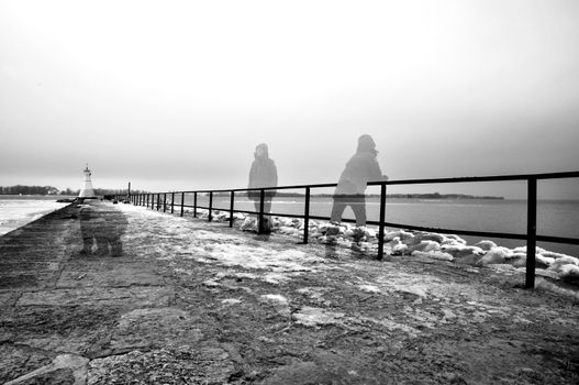 Surreal artistic image in black and white of multiexposured person.